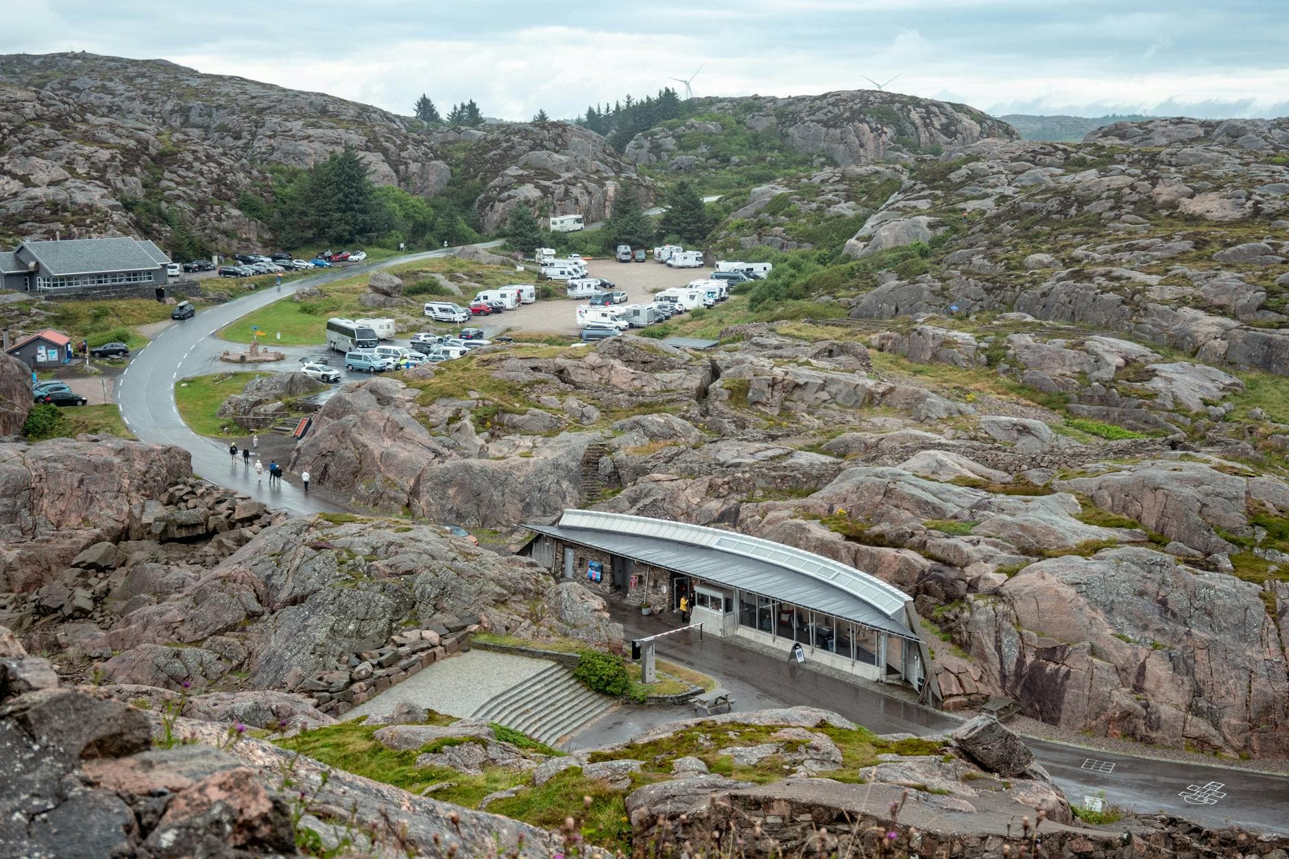 Aerial view of Lindesnes camping area with motorhomes and rocky terrain in Norway.