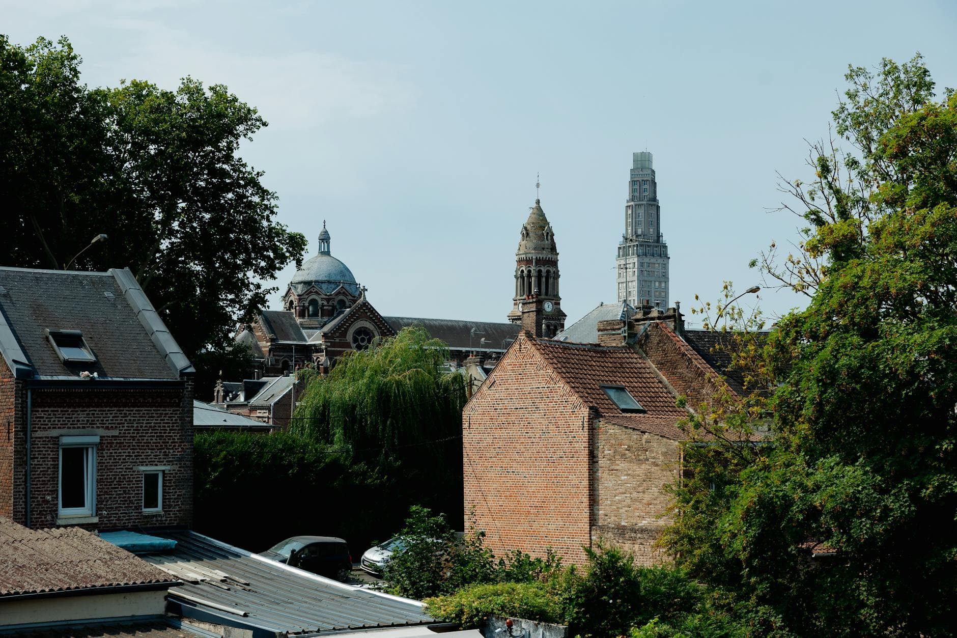 Historic skyline view of Amiens, featuring iconic towers and classic European architecture.