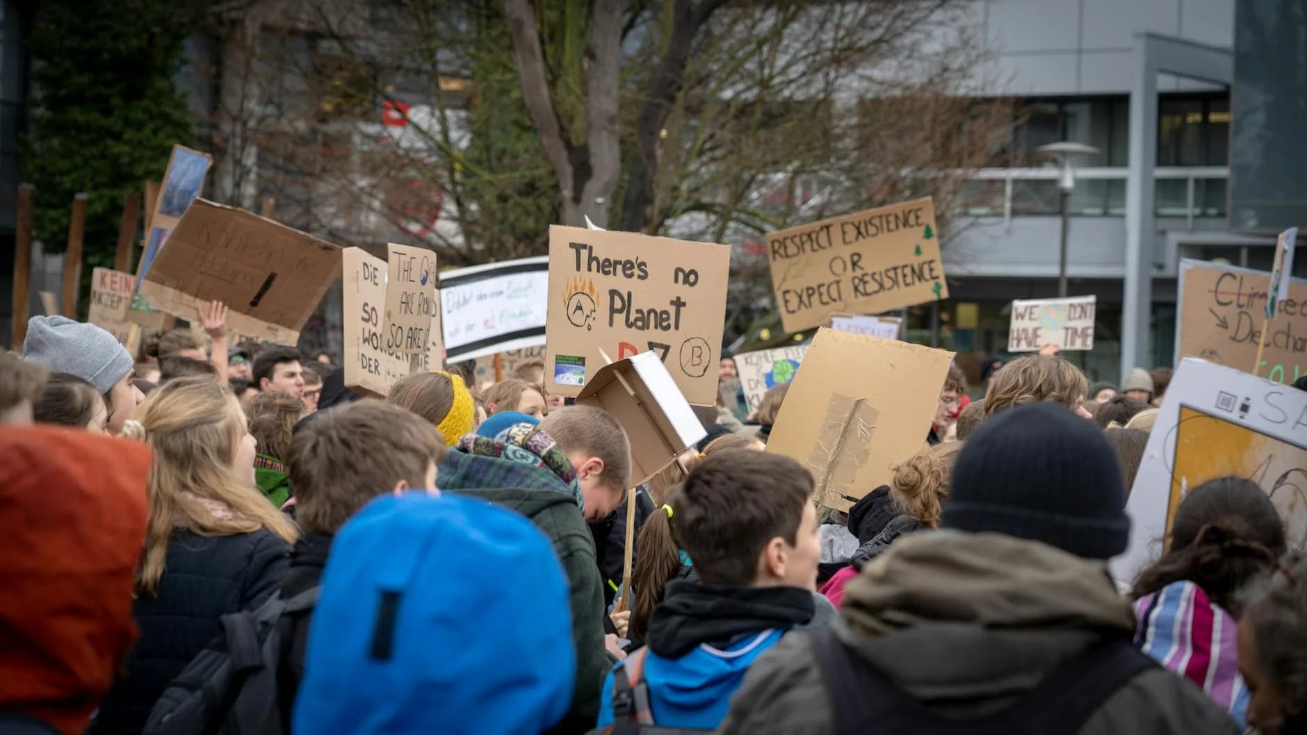 A large group of climate activists protesting with signs in Erlangen, Germany.