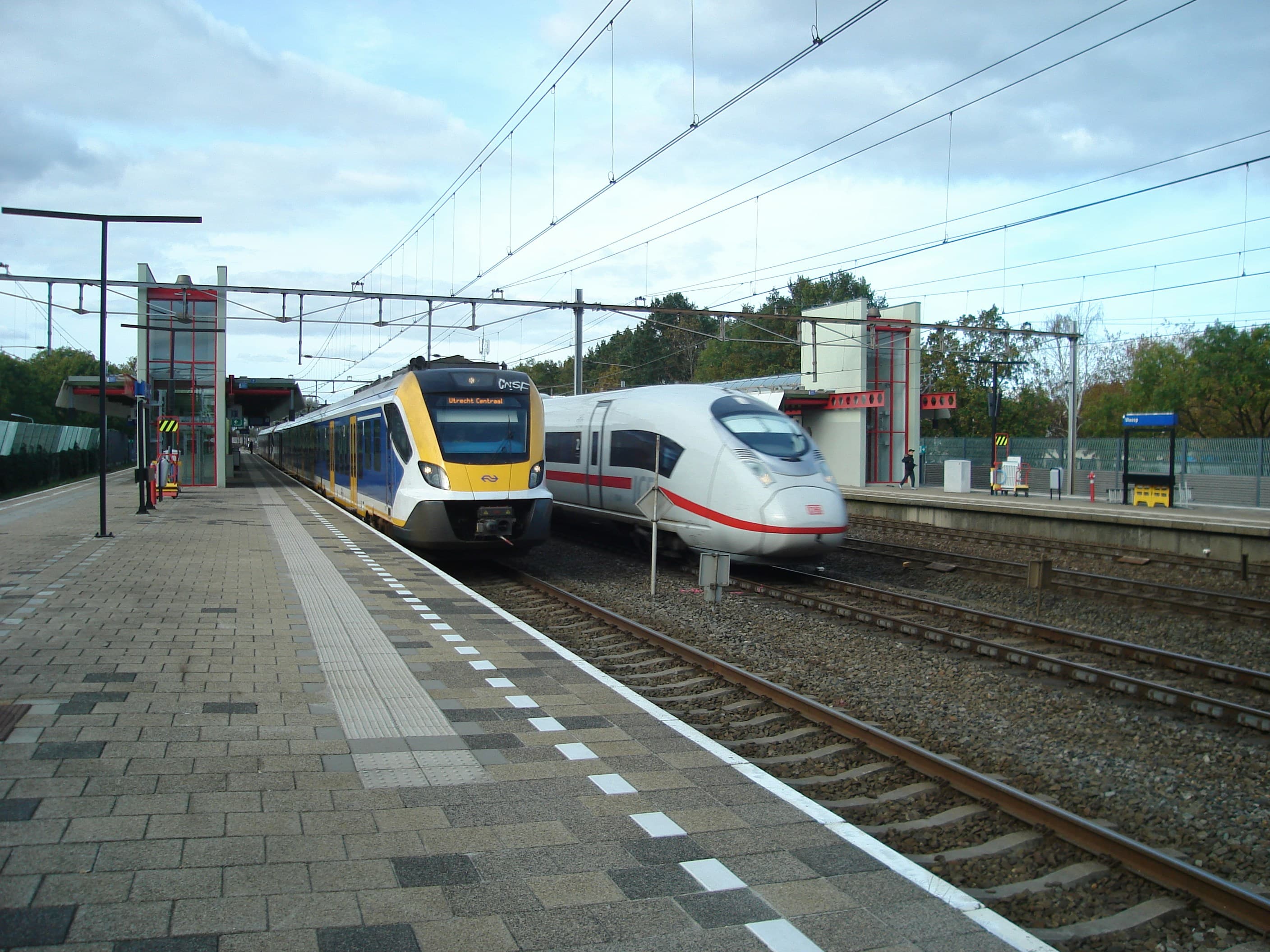 Two trains at a station platform